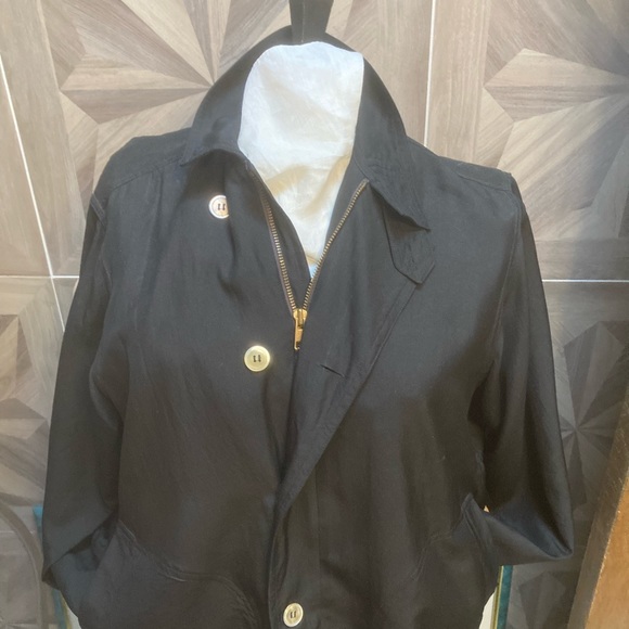 Black silk jacket pockets, abalone buttons, zipper and pleat in back. - Picture 5 of 5